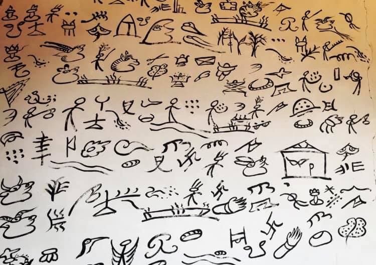 普段は農民として働き、住民の依頼を受けた時にトンパの活動を行うナシ族(李さん特別編)